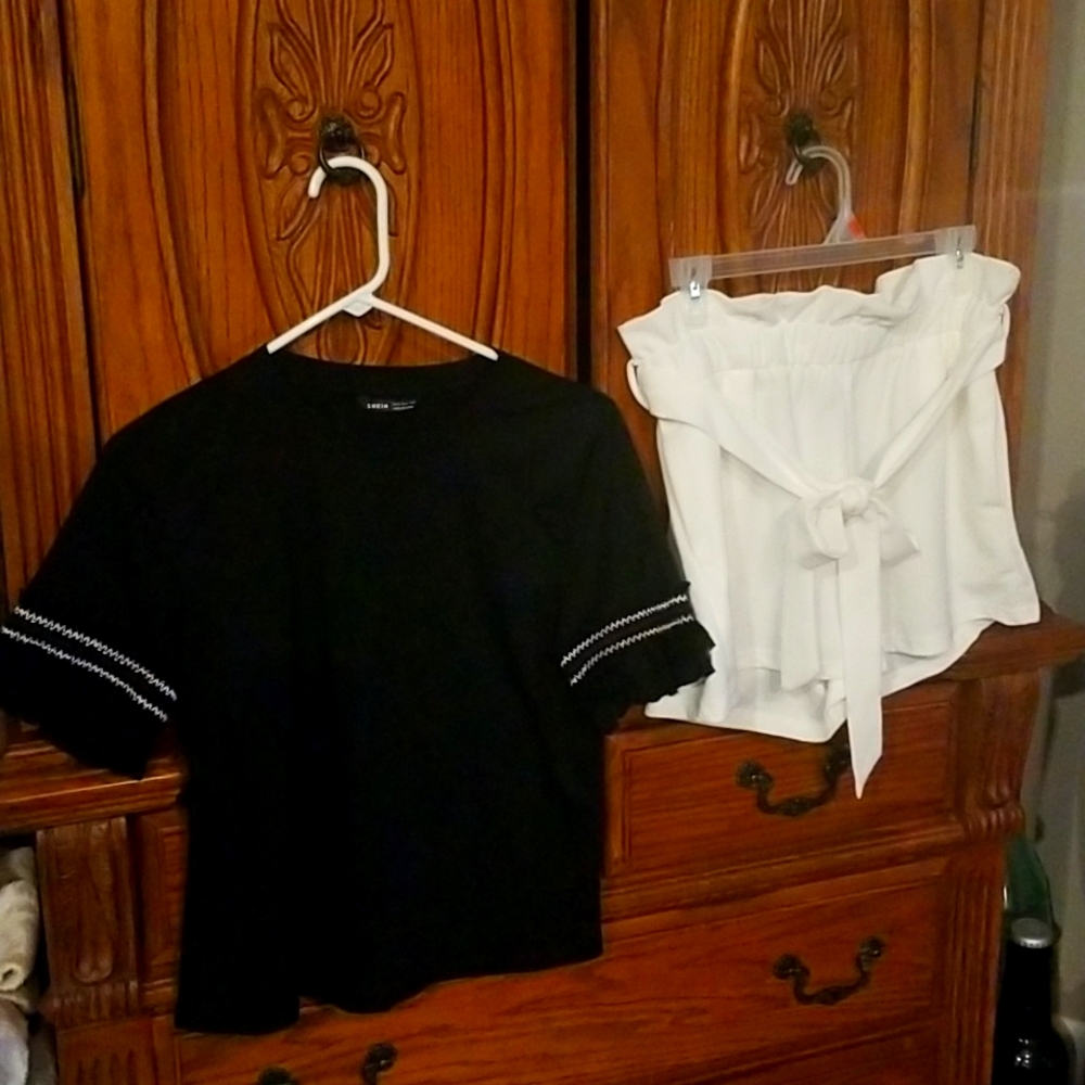 Black shirt with ruffle sleeves